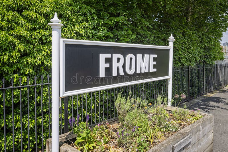 Frome Railway sign on the platform at Frome Railway Station, in Frome, Somerset, UK stock photo