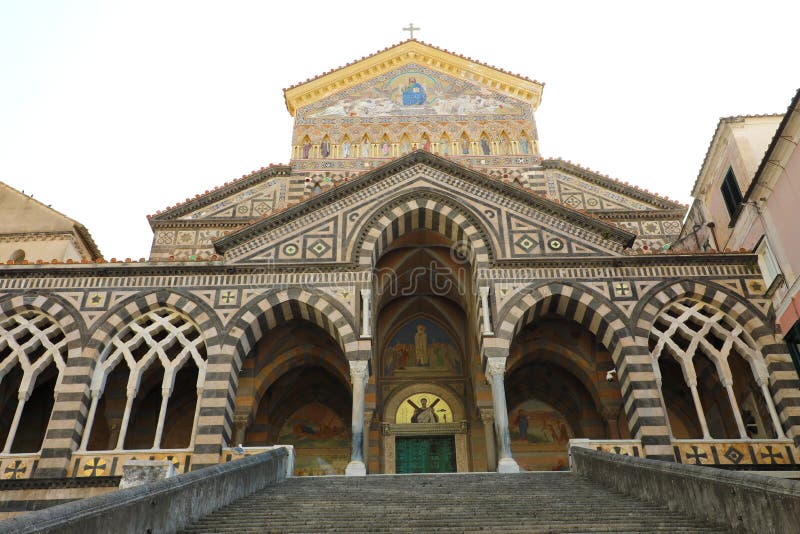 The front facade of Amalfi Cathedral dedicated to the Apostle Saint Andrew, with striped marble and stone, Amalfi, Southern Italy royalty free stock image The front facade of Amalfi Cathedral dedicated to the Apostle Saint Andrew, with striped marble and stone, Amalfi, Southern Italy royalty free stock image