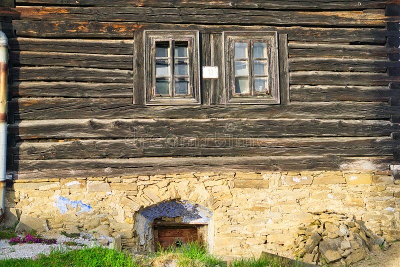 The front face of old wooden house in Pavlany village in Spis region in Slovakia