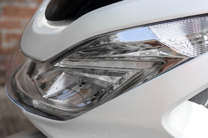 Front Headlight with a Windshield of a Motorbike. Motorcycle, Side View