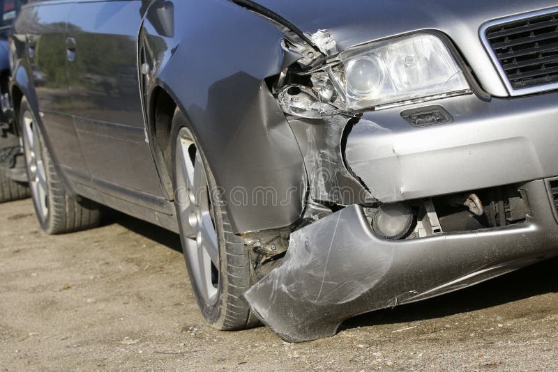 Front of silver car get damaged by crash stock photo Front of silver car get damaged by crash stock photo