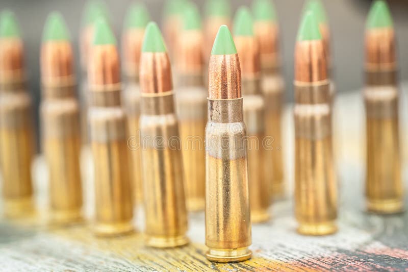 Front view of ammunition for rifle machine gun on the table stock photo