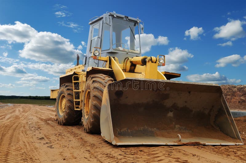 Front view of diesel wheel loader bulldozer royalty free stock image