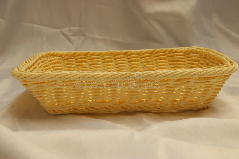 Front View of Handmade Woven Rectangular Wicker Bread Basket Stock