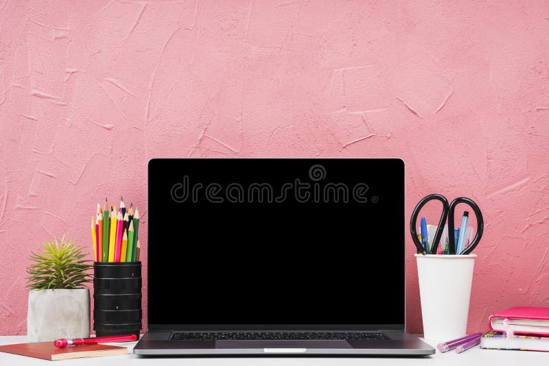 Front View Laptop with Stationery Elements. High Quality Photo Stock