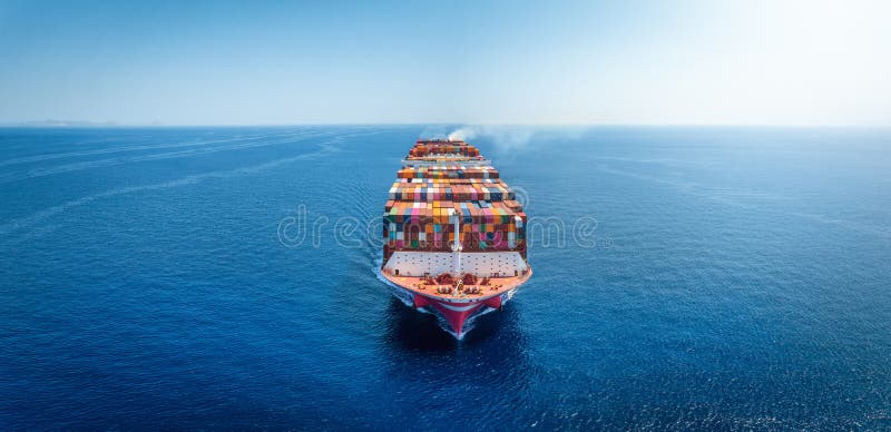 Front view of a large container cargo ship stock images