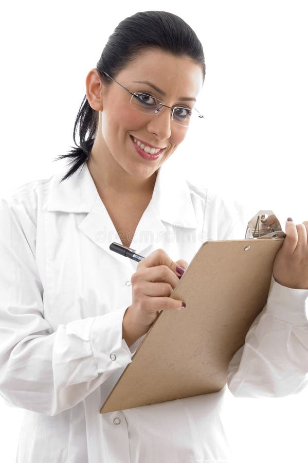 Front view of smiling doctor with writing pad