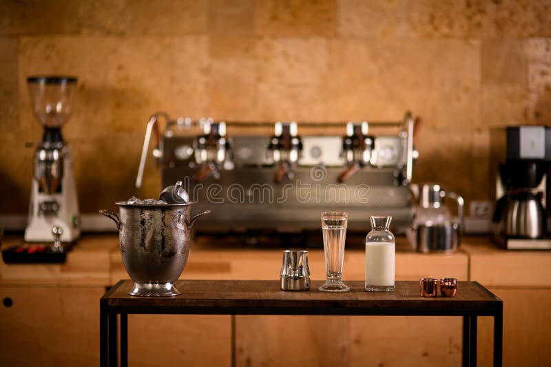 Front View of Table with Kitchen Equipment for Making Coffee and