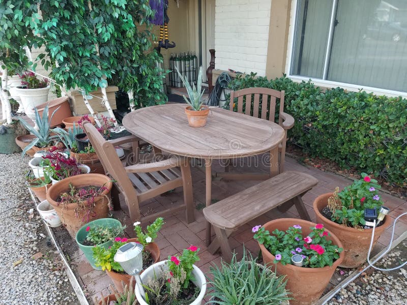 Front yard wood table editorial stock image. Image of wood 130465849