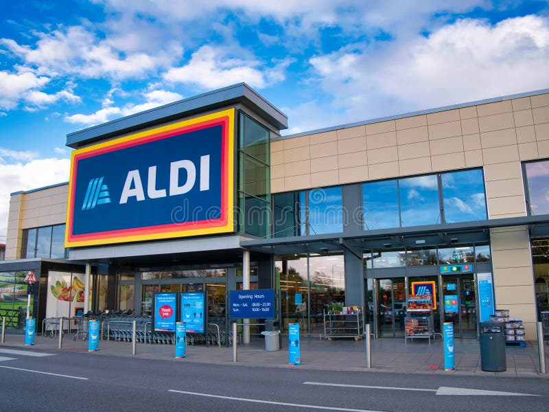 The frontage and brand logo of a branch of German discount retailer Aldi, taken in a local retail park in the UK