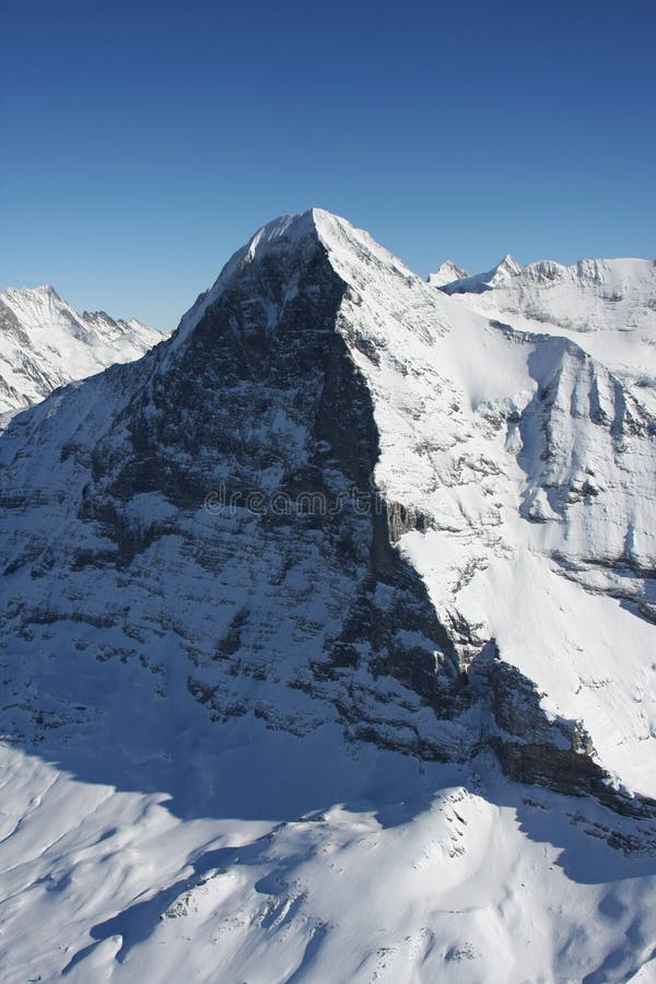 Winter in the Swiss high alps, famous Eiger North Face. Winter in the Swiss high alps, famous Eiger North Face