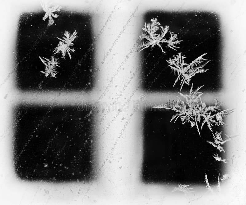 Frost design und Wasser Streifen auf meinem Fenster mit den Nachbarn Fenster einen Rahmen zu erstellen in der Ferne und snow falling in between.