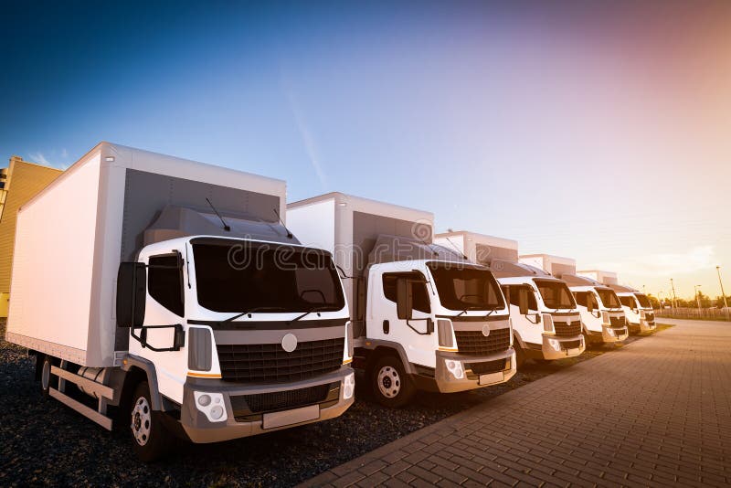 Frota de caminhões de entrega comerciais no estacionamento da carga