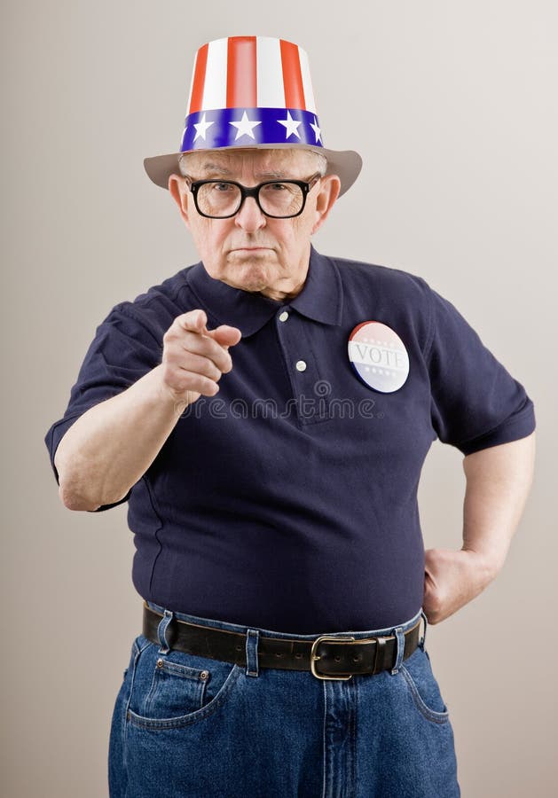 Frowning patriotic man in American flag hat