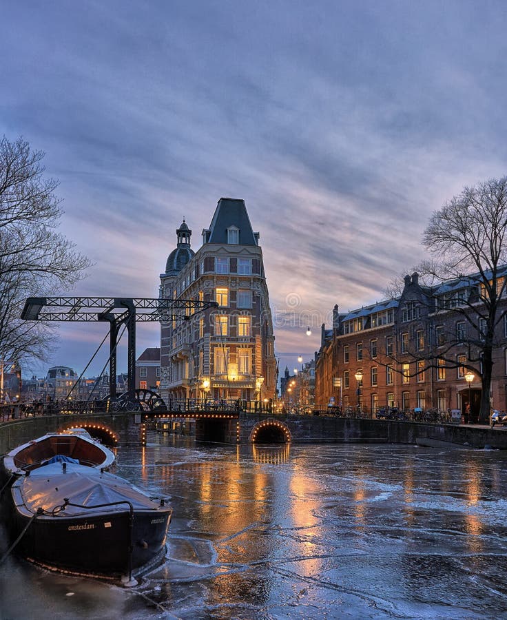 Frozen canal in the winter in Amsterdam