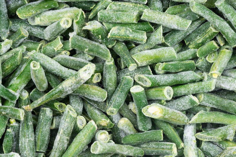 Frozen Chopped Green String Beans Texture Background. Iced Beans Background for Food Textures