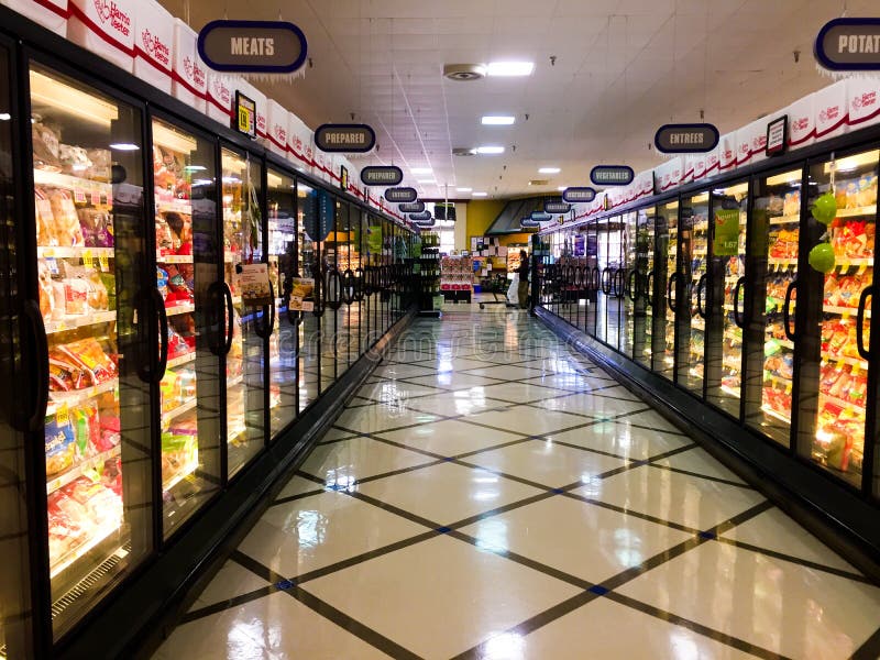 Frozen foods aisle of grocery store.
