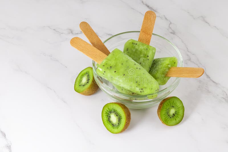 Frozen Fruit Kiwi Juice in a Bowl. Refreshing Popsicle on a Stick Stock Photo Image of sweet