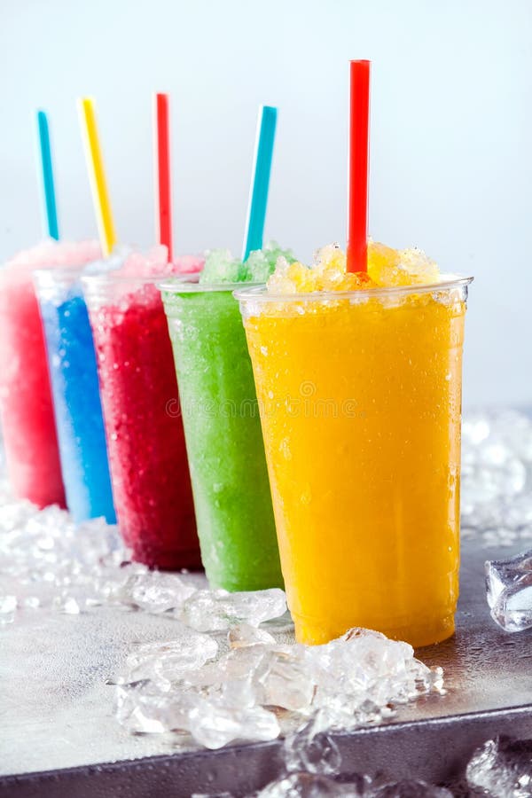 Download Frozen Fruit Slush Granitas In Plastic Cups Stock Image - Image of many, frozen: 68388777