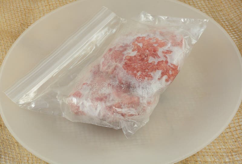 Frozen Hamburger patties stock image. Image of uncooked 79397991