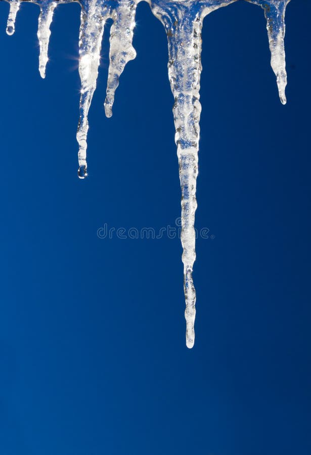 Frozen Icicles Blue Sky Background