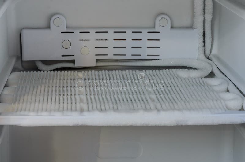 Frozen, icy frost-covered refrigerator tubes in the refrigerator freezer royalty free stock image Frozen, icy frost-covered refrigerator tubes in the refrigerator freezer royalty free stock image