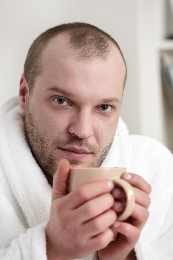 Frozen man with tea cup stock image. Image of background 23604797
