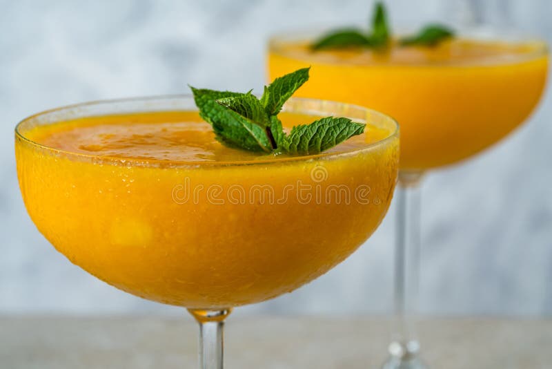 Frozen mango daiquiri stock photo. Image of garnish 254416892