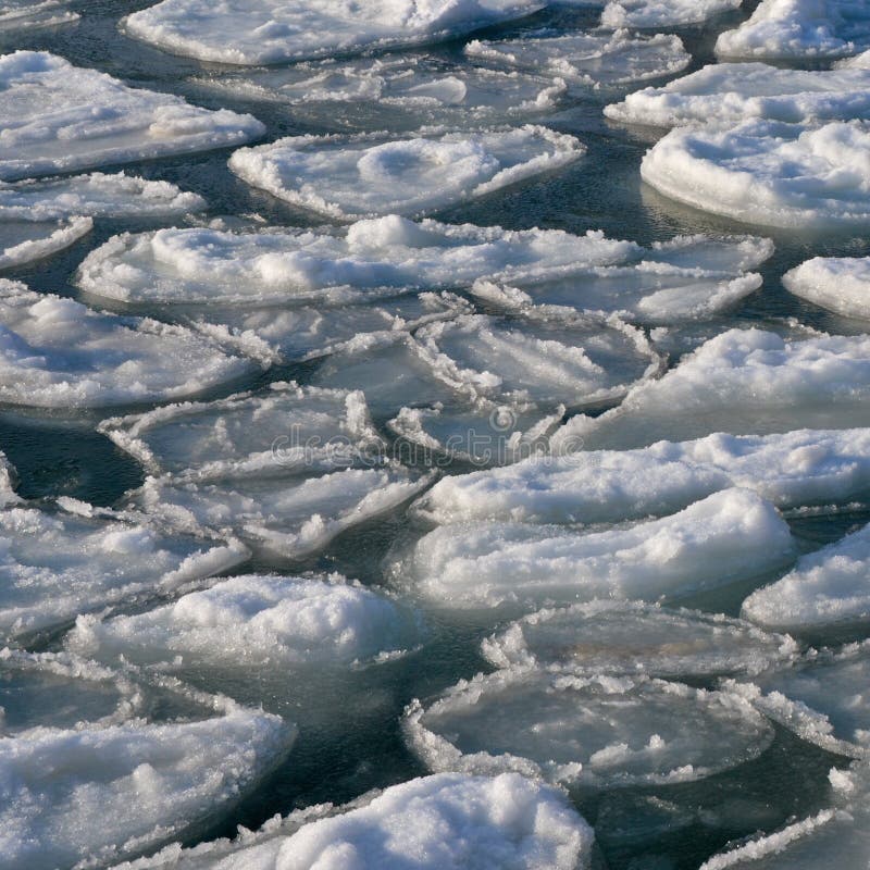 Frozen ocean - broken piece of ice in sea water