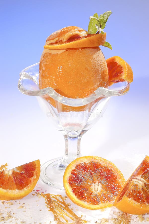 Frozen orange filled by orange sorbet