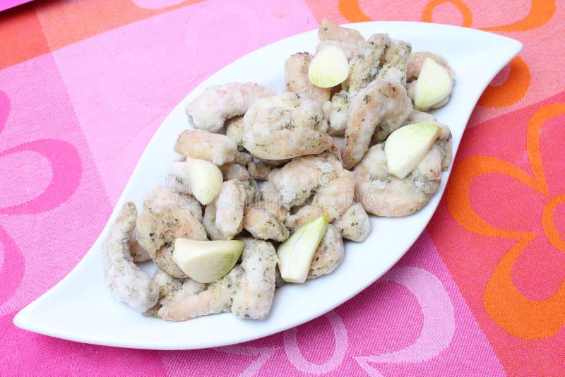 Frozen prawns with garlic stock image. Image of dish 35405139