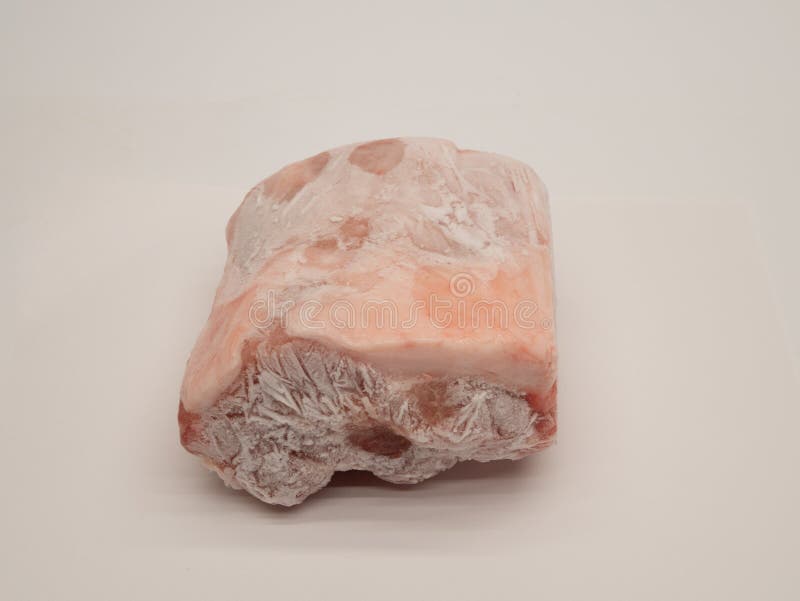 Frozen Raw Pork. Frozen Raw Meat. Piece of Frozen Meat. Stock Image