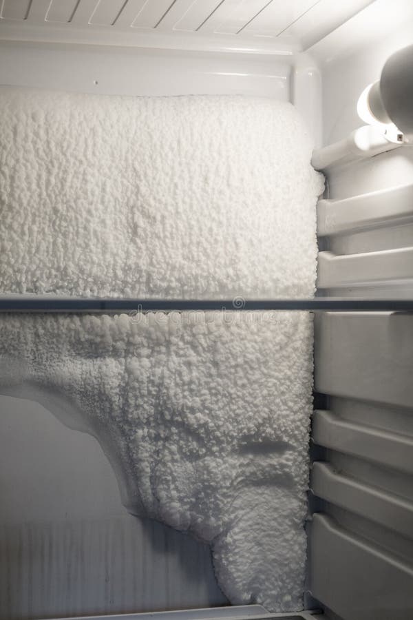 Frozen Refrigerator that Needs To Be Defrosted. Stock Photo Image of