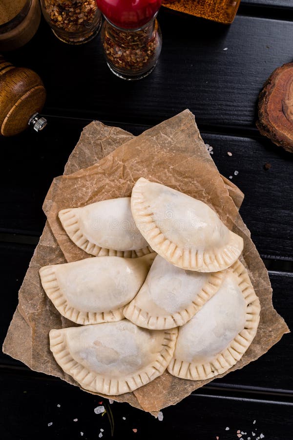 Frozen Russian Crude Pelmen or Dumplings. Close Up. Stock Photo Image
