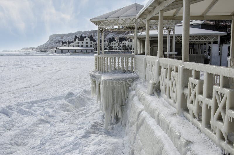 Frozen sea and ice-covered part of the summer cafe stock image Frozen sea and ice-covered part of the summer cafe stock image