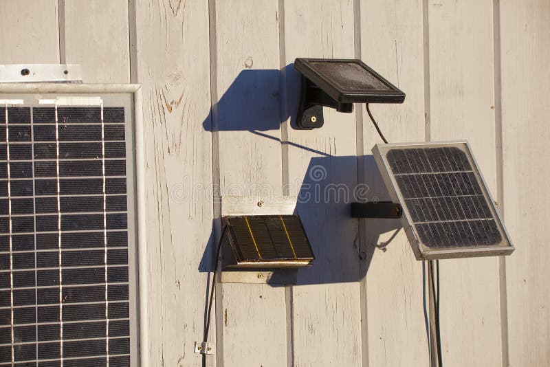 Frozen solar panels on house in winter