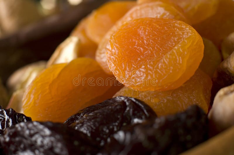 Dry fruit in wooden bowl close up