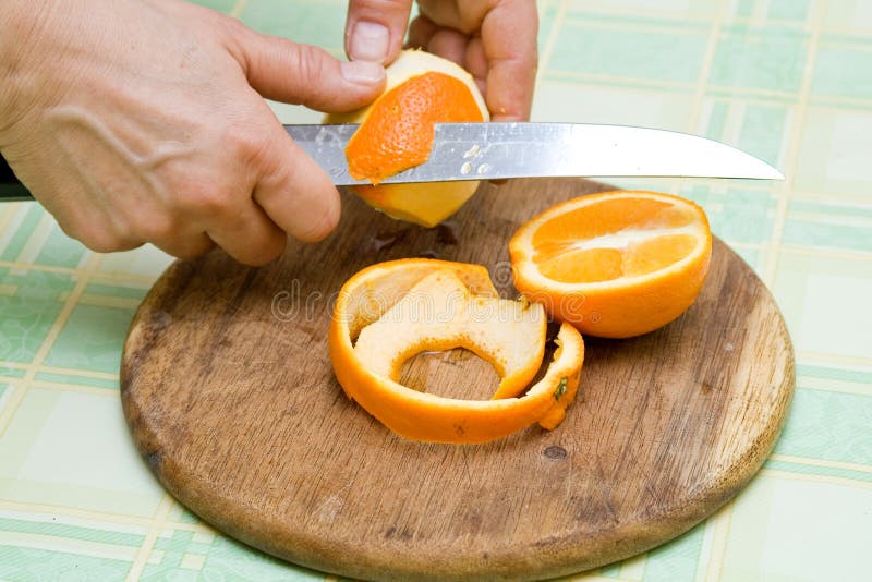 Peeling fruit stock photo. Image of peel, hands, uniform 4405418