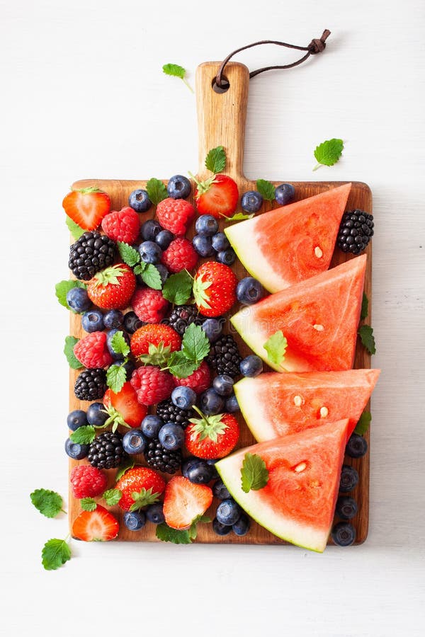 Fruit and berry platter over white. blueberry, strawberry, raspberry, blackberry, watermelon