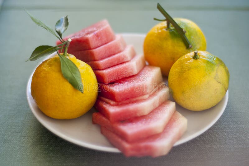 Fruit Breakfast of Watermelon, Mandarins and Tangerine Stock Photo