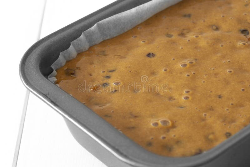 Fruit Cake Loaf Mixture in a Metal Baking Tin. Stock Photo Image of