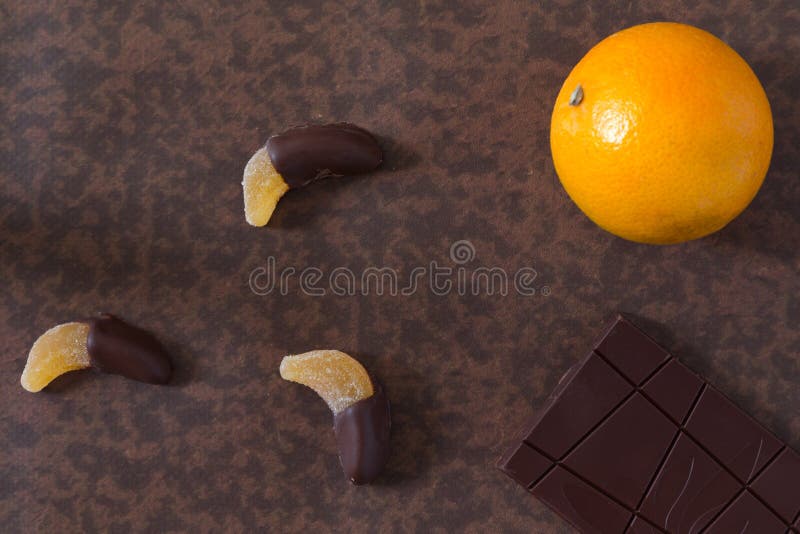 Fruit Candy Dipped in Chocolate, Together with a Chocolate Bar a Stock