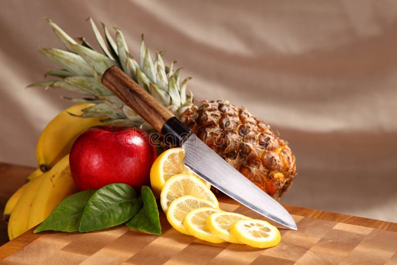 Fruit on a chopping board stock photo. Image of foreground 55765400