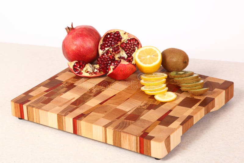 Fruit on a chopping board stock image. Image of wooden 55720073
