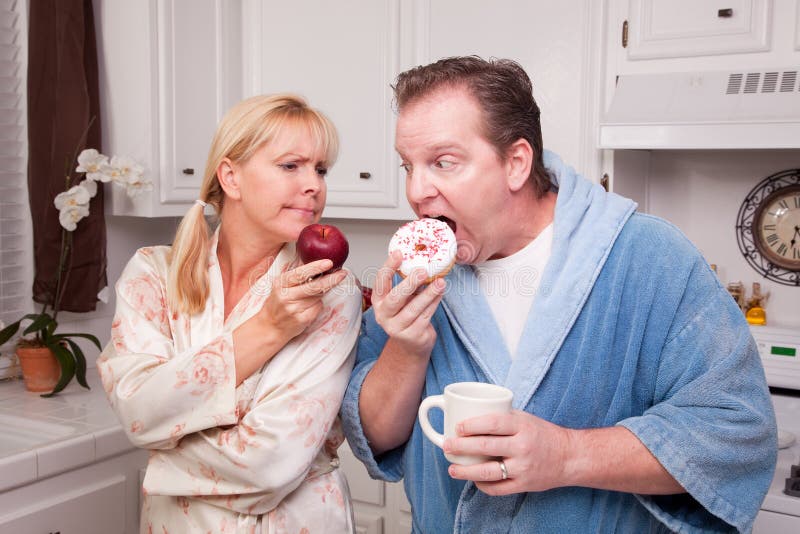 Fruit or Donut - Healthy Eating Decision stock photos Fruit or Donut - Healthy Eating Decision stock photos