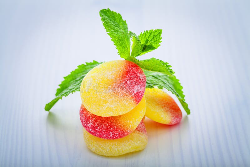 Fruit gums and mint leaf stock photo. Image of colorful 31589350