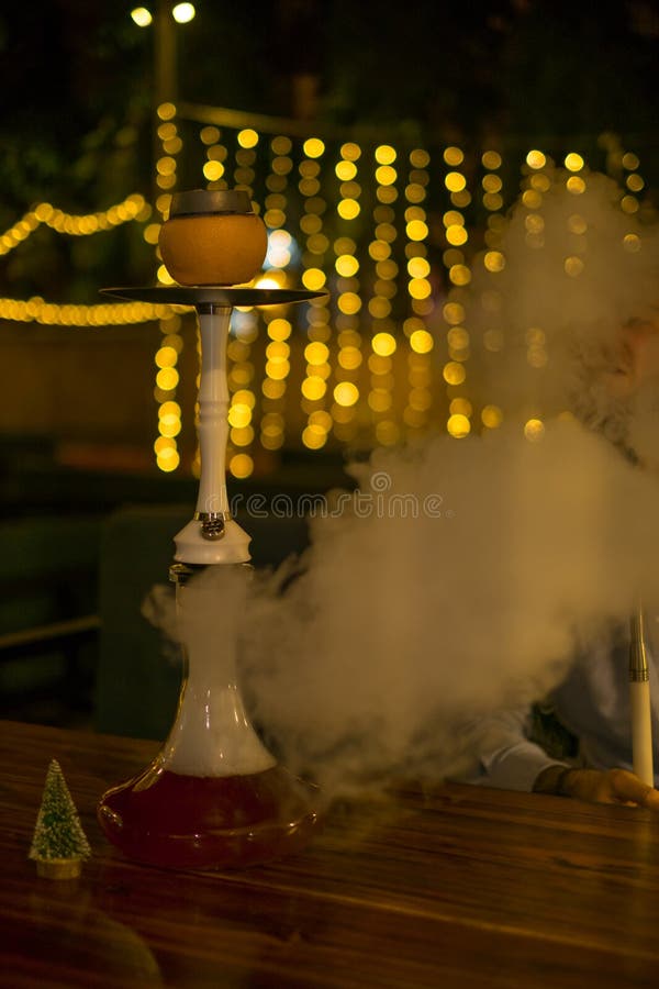 Fruit Hookah Stands on the Table. Grapefruit Hookah. for Restaurant