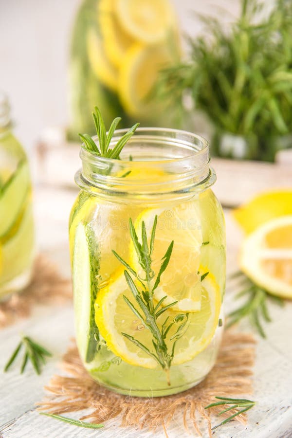 Fruit Infused Detox Water with Lemon, Cucumber and Rosemary Stock Photo