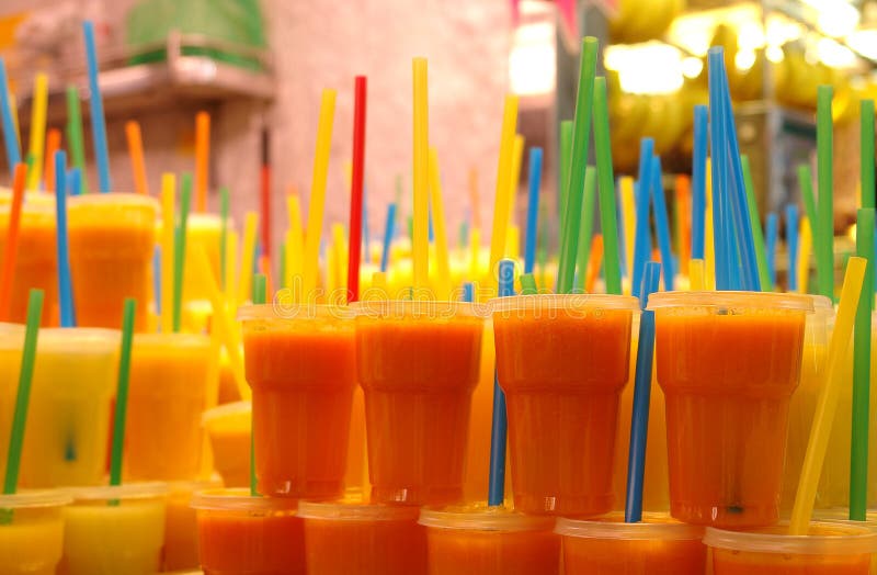 Fruit juices with straws stock image. Image of straw 17091685