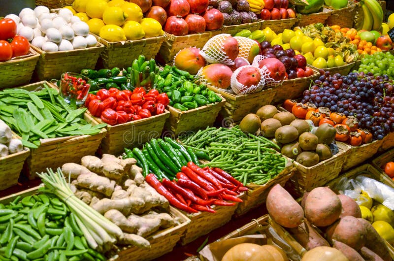 Fruit market with various colorful fresh fruits and vegetables